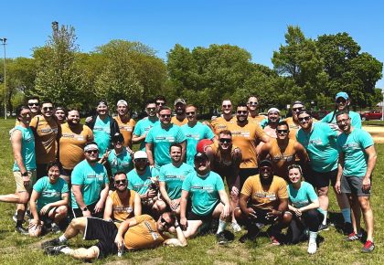 Caption: Stonewall Kickball teams Some Tops Required and Big Kick Energy pose after a recent game. Photo provided by Some Tops Required.